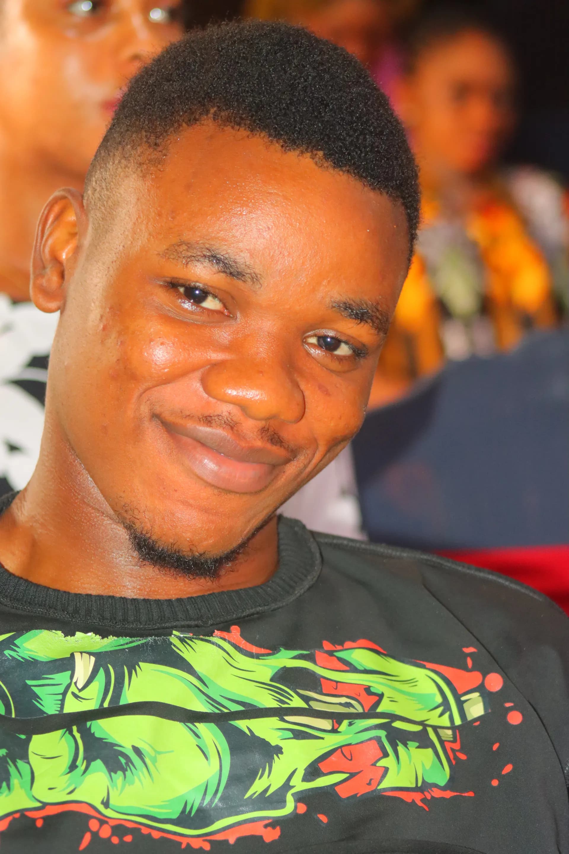 A young member of the congregation smiling