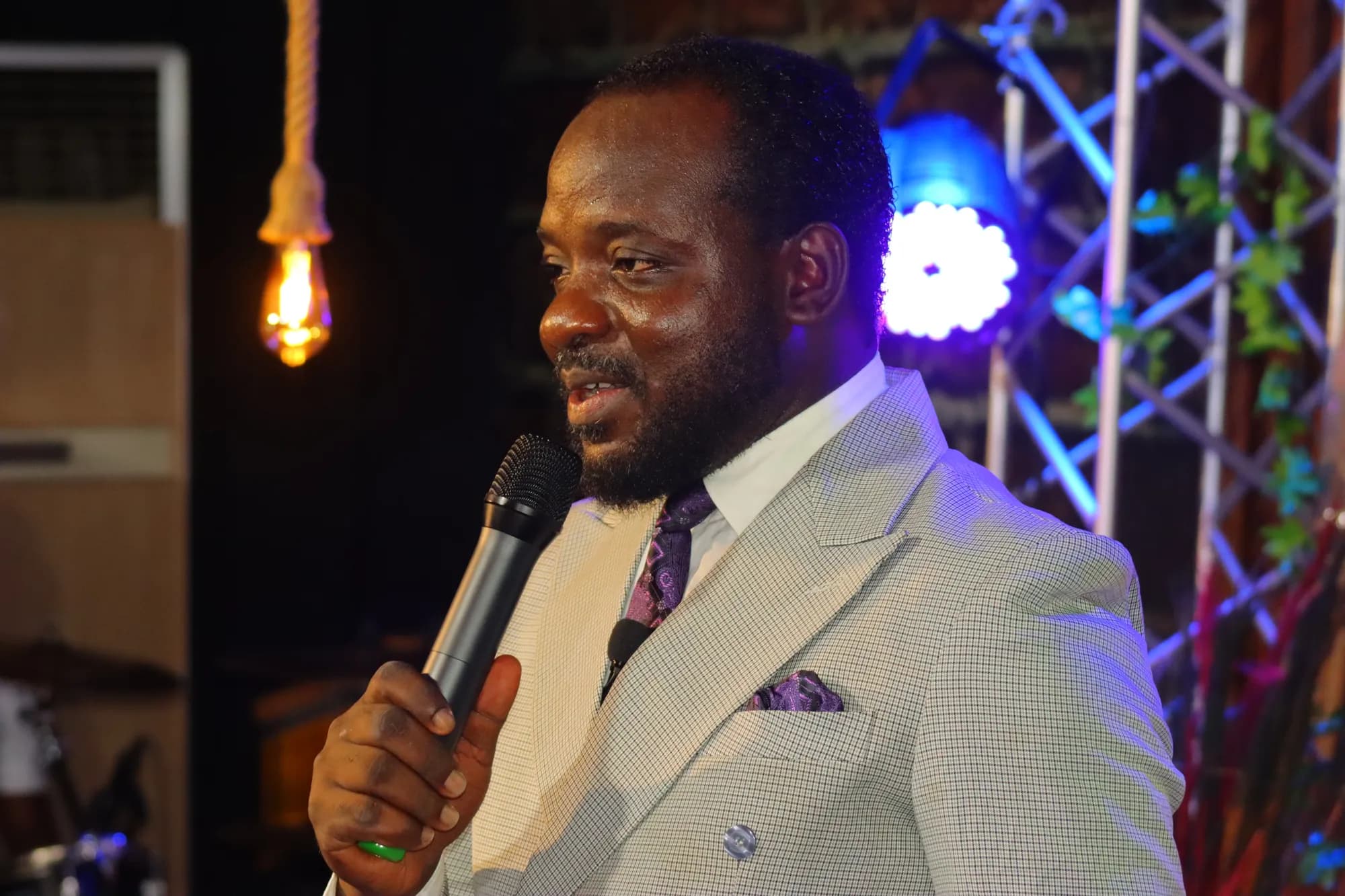 A minister rejoicing mid-service at Worldlight